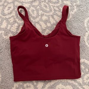 Size small red workout top with built in bra. Brand is 90 DEGREE by Reflex